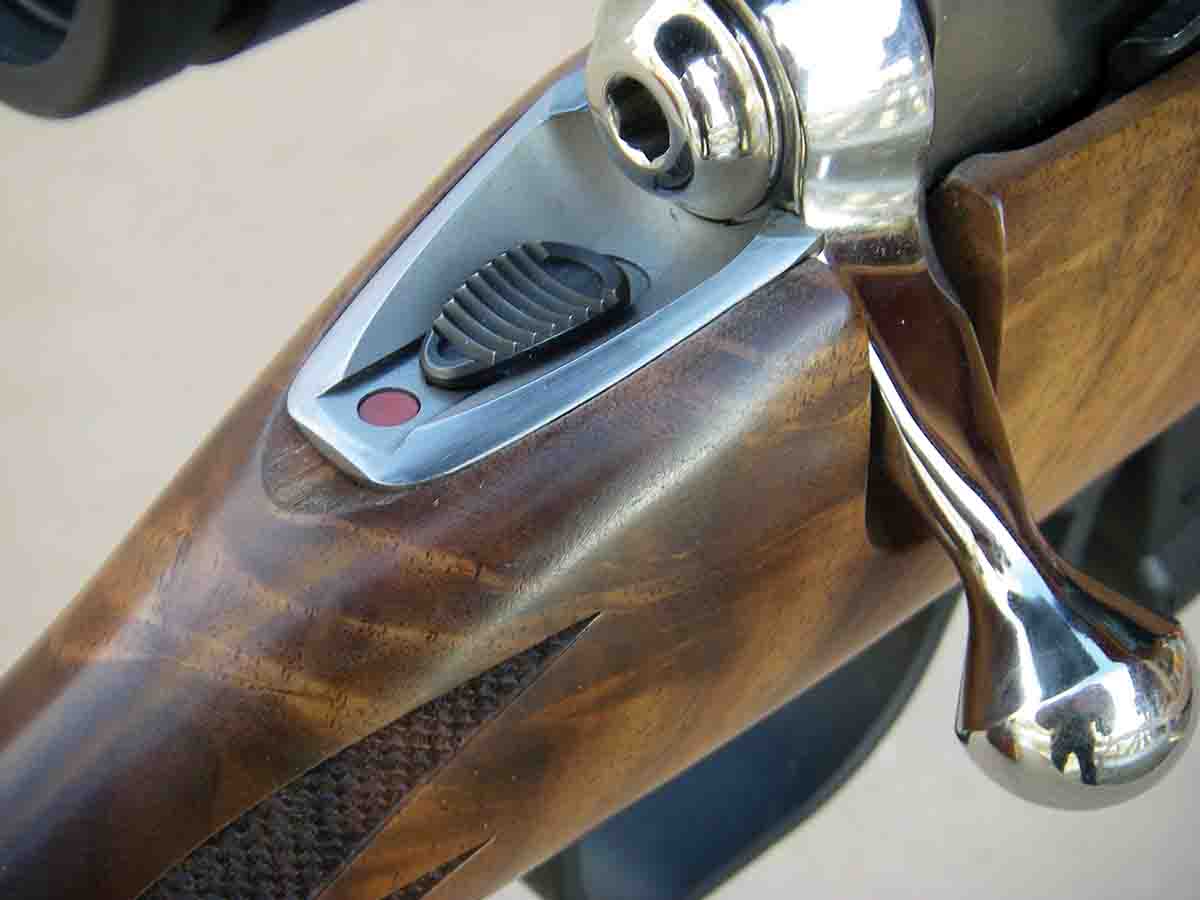 The three-position safety is mounted on the tang.